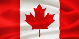 Flag of Canada waving in the wind. Silk texture pattern
