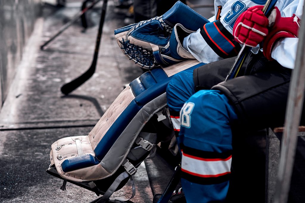 Hockey player saved with an AED during game.